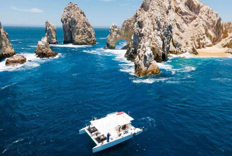 Cabo Catamaran Snorkel: Arch & Santa Maria, Open Bar, Snacks - Where the Catamaran Ride Starts: D Dock to the Famous Arch