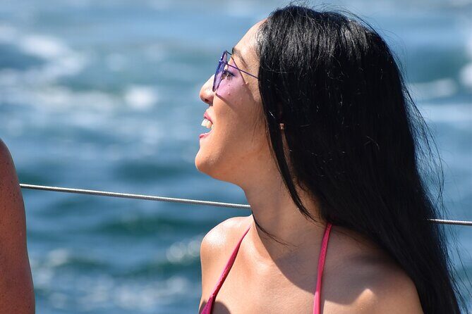 Cabo Escape Sunset Cruise with Dinner and Open Bar - Boarding at CaboMarina: meeting point, dock fee, and what to expect