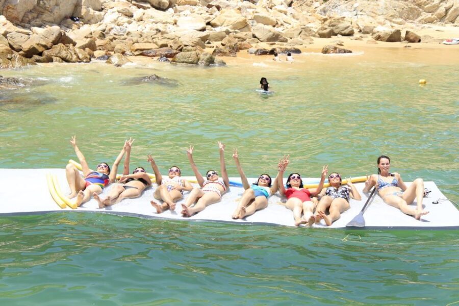 Cabo San Lucas: Private Catamaran Cruise - Anchor time: cocktails, lily pad lounging, and paddle board cruising