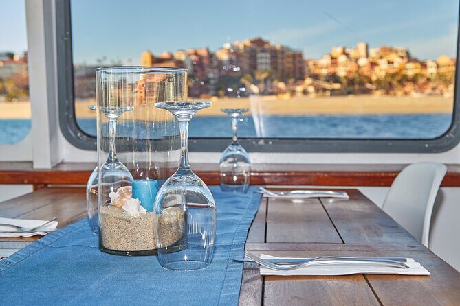 Cabo Sunset Dinner Cruise with Live Music & Open Bar on Cabo Wave - Practical logistics: the meeting point and the small extra fee