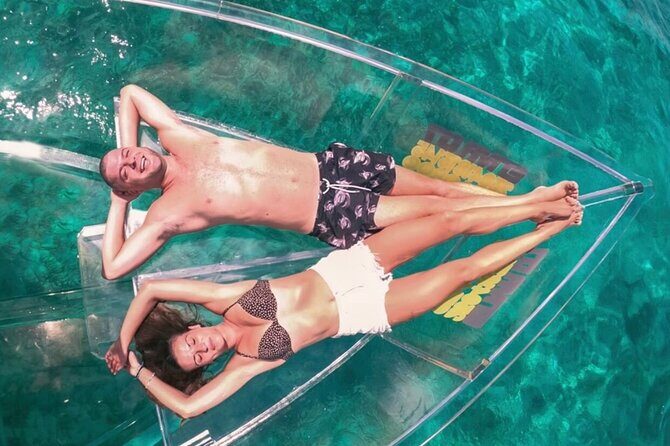 Cabo's Original Clear Boat Tour! See it all in one tour! - Neptune’s Finger and the Bay: rock shapes plus sea-life watching