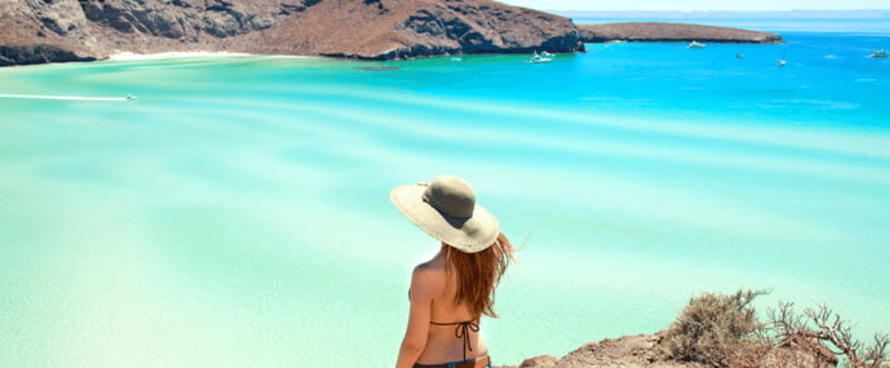 From Los Cabos: City Tour La Paz, Balandra and Todos Santos - Playa El Coromuel: a calmer hour with palm shade
