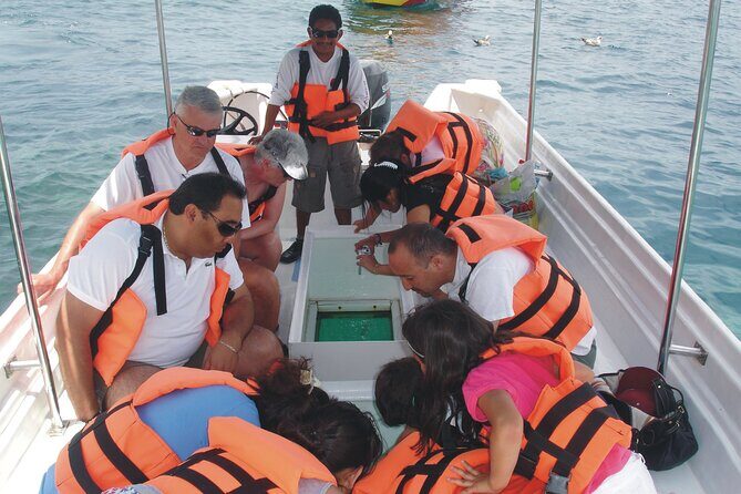Glass Bottom Boat Ride to the Arch - A possible swim at Lovers Beach after the boat time
