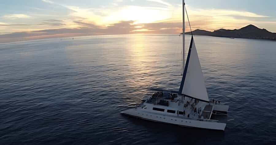 Los Cabos Catamaran: Iconic Sunset Cruise with Drinks & DJ - Adults-Only Party Energy: Drinks, DJ, and a Lily Pad Mat