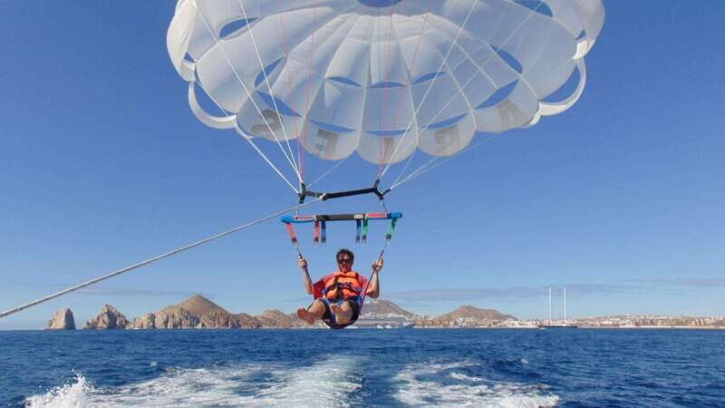 Parasailing in Cabo San Lucas - The views you came for: Land’s End, Cabo Arch, and the ocean meeting point
