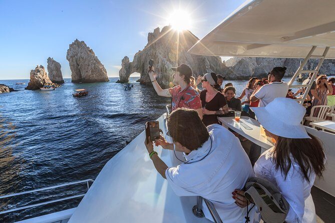 Sunset Dinner Cruise in Cabo San Lucas - On-board vibe: energetic crew, music, and a steady pace