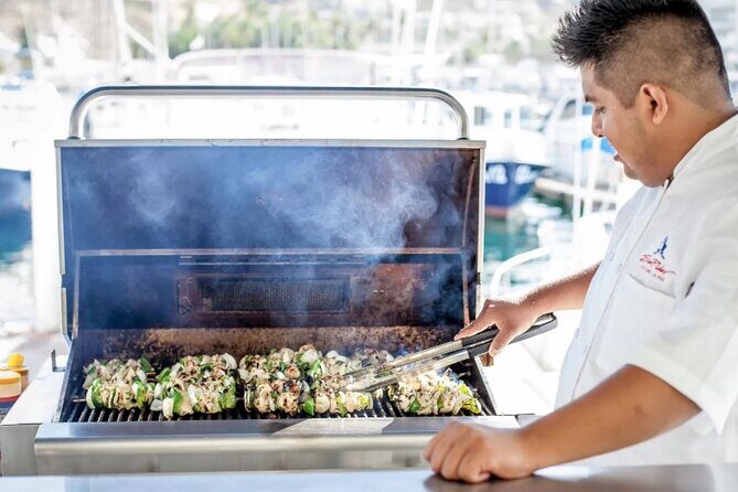 Sunset Dinner Cruise in Los Cabos - Music, dancing, and the crowd mix you can’t ignore