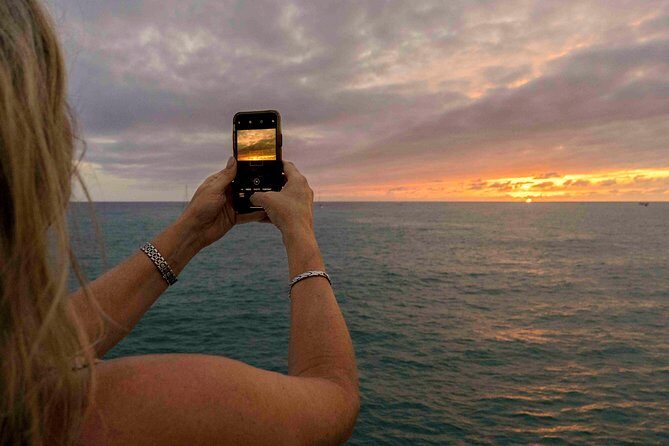 Sunset Mexican Dinner Cruise and Live Music in Cabo San Lucas - Live DJ and band music: party mood without losing the views